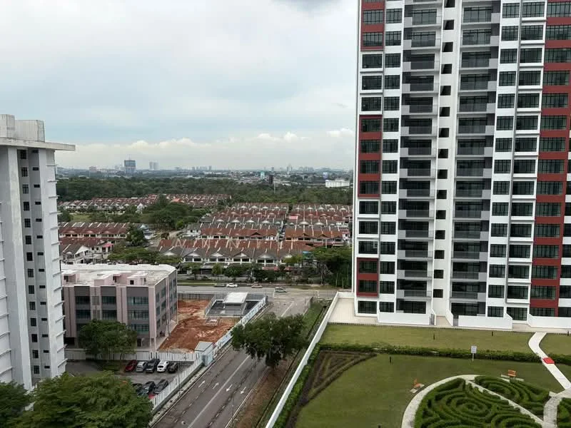 Exterior type: high-rise condominium; features: glass curtain wall, red and white facade, surrounded by landscaped garden, manicured lawn, adjacent to road, view of residential area, urban skyline in background; style: modern.