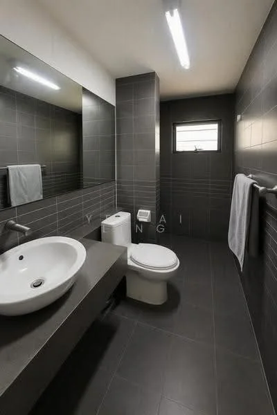 Bathroom features: wall-mounted sink, white ceramic sink, chrome basin mixer faucet, one-piece toilet, grey tiled walls, dark grey floor tiles, large mirror above sink, recessed ceiling lights, window for natural light, towel rack, hand towel, bath towel; style: modern.