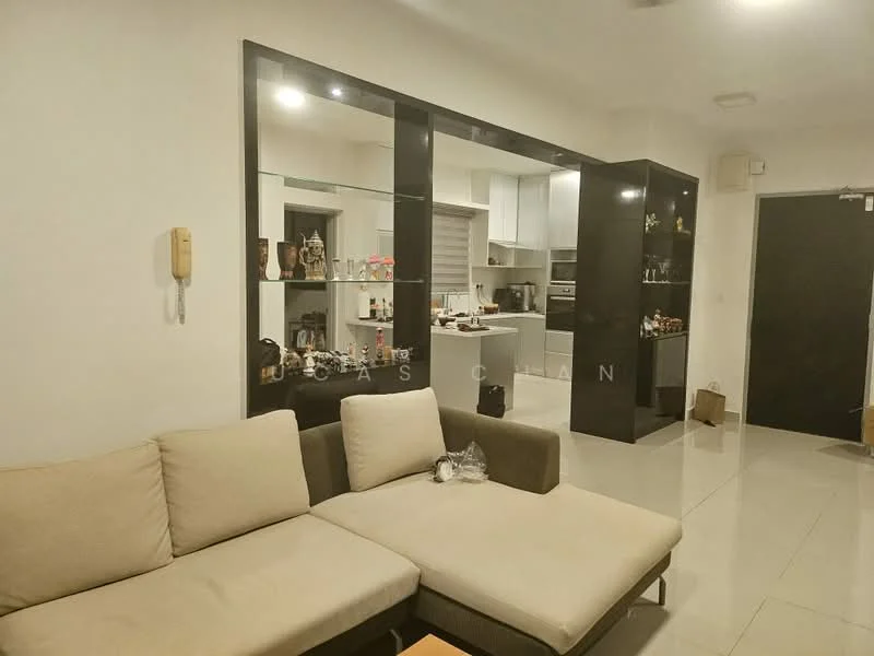 Living features: L-shape sectional sofa in beige, coffee table, white walls, tile flooring, recessed downlights, open-plan layout, glass shelving unit, kitchen area visible in background, kitchen cabinetry, stainless-steel appliances; style: modern.