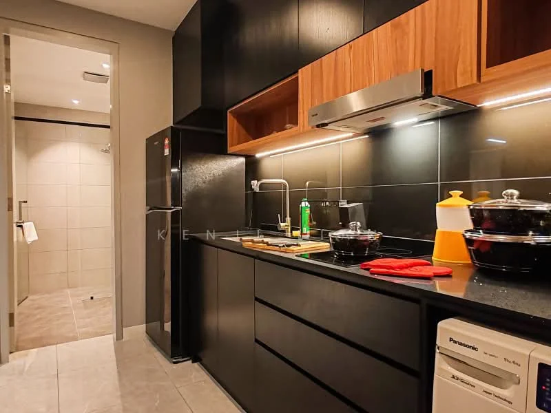 Kitchen features: black cabinetry, wooden upper cabinets, black countertop, stainless-steel sink, chrome pull-down faucet, built-in oven, freestanding fridge, ceramic tile flooring, recessed LED downlights, kitchen utensils on countertop, glass cooking pot, yellow condiment container, red kitchen towel; style: modern. Room features: white tiled walls, grey tiled flooring, shower area visible.