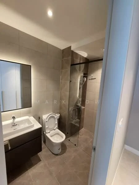 Bathroom features: single-sink vanity with dark wood cabinet, white ceramic sink, chrome basin mixer faucet, framed mirror, walk-in shower with glass enclosure, rain shower head, handheld shower, one-piece toilet, tile cladding on walls, grey ceramic tile flooring, recessed downlights; style: modern.