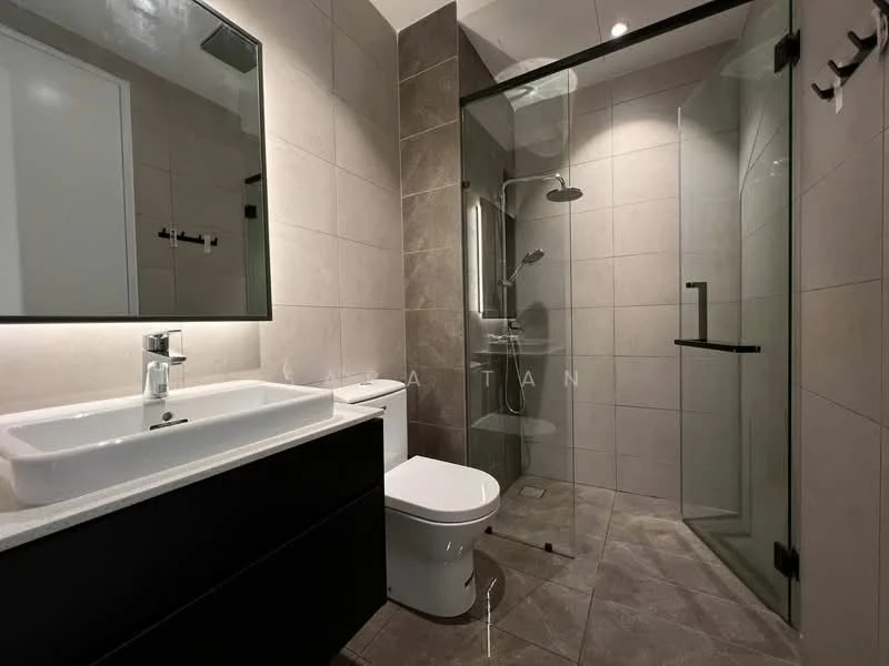 Bathroom features: single-sink vanity with black cabinet, white countertop, framed mirror, walk-in shower with glass enclosure, chrome shower head, chrome wall-mounted faucet, one-piece toilet, grey tile flooring, grey wall tiles, recessed downlights; style: modern.