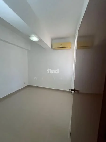 Room features: white painted walls, ceiling with recessed lighting, 2 wall-mounted split AC units, light-colored tile flooring, single door, no visible furniture or decor.