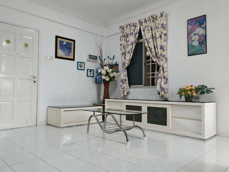 Living features: white painted walls, white tiled flooring, ceiling with crown moulding, large window with floral curtains, glass coffee table, white TV console with storage, framed artwork on walls, decorative flower arrangement, wall-mounted air conditioning unit; style: modern.