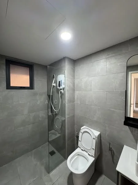 Bathroom features: grey tile flooring, grey tile walls, walk-in shower with glass enclosure, rain shower head, handheld shower, one-piece toilet, framed mirror, vanity with sink, recessed downlights, small window, shower heater; style: modern.
