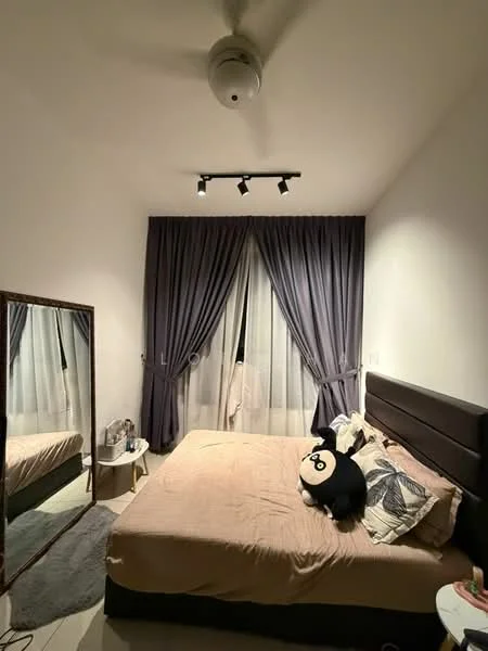 Bedroom features: queen-size bed with beige bedding, upholstered headboard, floor-to-ceiling windows with sheer curtains, grey curtains, 3-blade ceiling fan, decorative mirror, nightstand with lamp, plush toy on bed, area rug, wall-mounted track lighting; style: modern.