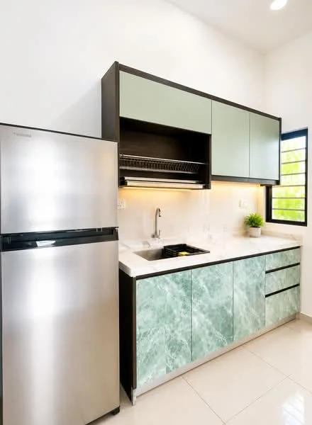 Kitchen features: stainless-steel fridge, single-bowl stainless-steel sink, chrome pull-down faucet, marble countertop with green veining, green cabinetry with flat-panel design, black cabinetry, built-in dish rack, recessed lighting, white walls, tile flooring; style: modern.