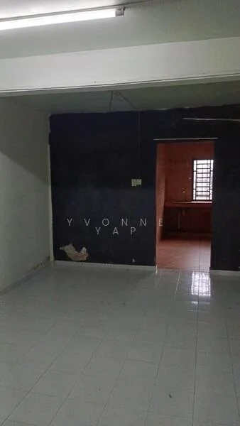 Room features: grey painted walls, white tiled flooring, window with metal grille, doorway leading to another room, exposed wall with damage, ceiling with fluorescent lighting.