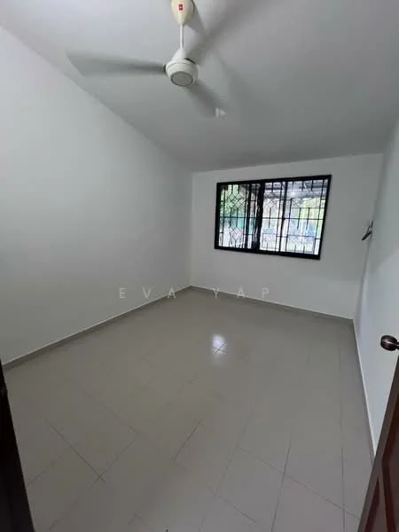 Room features: white painted walls, grey tiled flooring, ceiling fan, window with security bars, natural light from window.