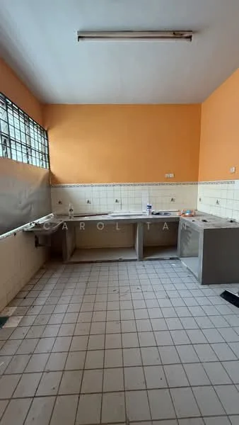 Kitchen features: orange painted walls, white tiled backsplash, grey cabinetry, double-bowl stainless-steel sink, wall-mounted faucet, tile flooring, window with metal grille, countertop space, exposed light fixture.