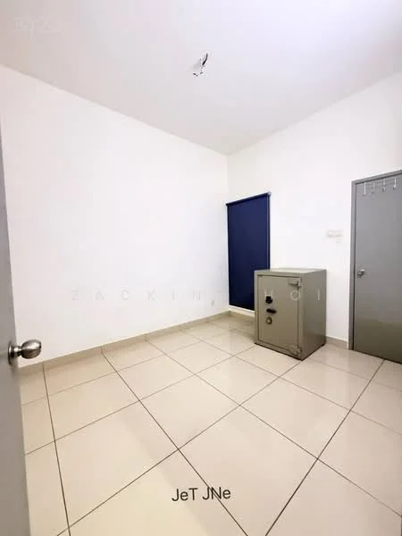 Room features: white painted walls, cream tiled flooring, blue roller blinds, metal safe, grey door, single light switch, no visible furniture.