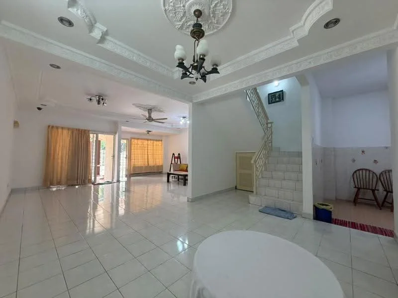 Living features: white painted walls, glossy ceramic tile flooring, tray ceiling with chandelier, 5-blade ceiling fan, large windows with sheer curtains, sliding glass door leading to outdoor area, open layout, decorative wall moulding; style: modern; view: garden. Room features: staircase with wooden railing, tile cladding on walls, two wooden chairs, small rug, blue mat on floor.