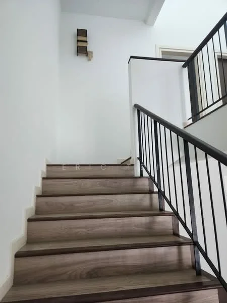 Room features: wooden staircase, metal railing, white painted walls, natural light from upper level, light-colored flooring, minimalist design; style: modern.