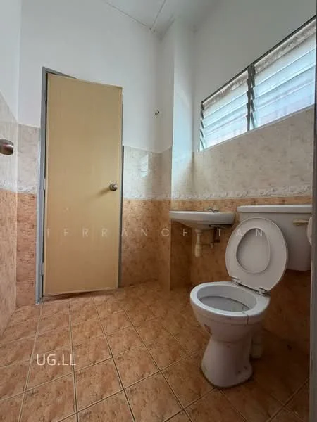 Bathroom features: white tiled walls, brown tiled walls, ceramic tile flooring, single-sink vanity, toilet, mirror above sink, window with horizontal slats, door, chrome faucet.