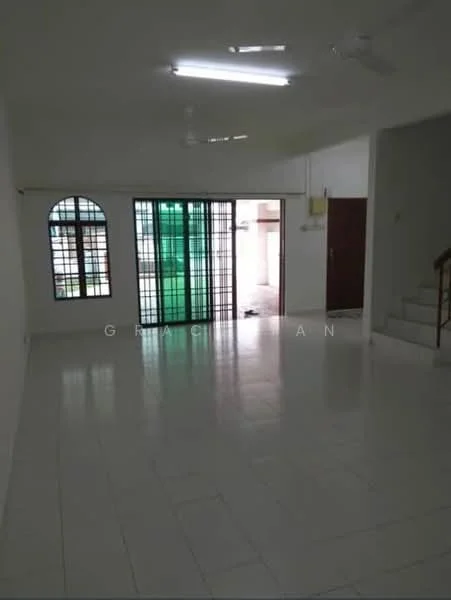 Living features: white painted walls, glossy tile flooring, ceiling fan, large windows with green grills, arched window, sliding glass door, staircase visible, natural light from windows.