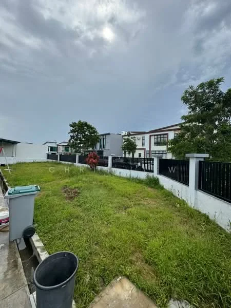 Exterior features: manicured lawn, fenced perimeter, concrete pathway, landscaped garden, surrounding trees, residential buildings in background, cloudy sky; style: modern.