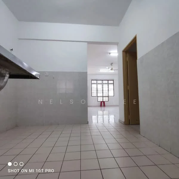 Kitchen features: white painted walls, light grey tiled flooring, stainless-steel sink, single-bowl stainless-steel sink, wall-mounted cabinets, open layout, window for natural light, fluorescent ceiling lights. Room features: white painted walls, light grey tiled flooring, large window, fluorescent ceiling lights.