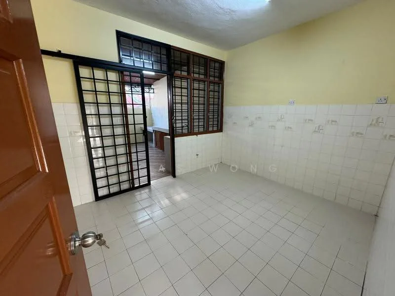 Room features: yellow painted walls, white tiled flooring, grid-patterned glass windows, wooden door, white tiled walls, corner space, natural light from windows, open layout to adjacent room.