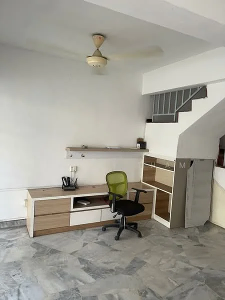 Room features: white painted walls, marble flooring, ceiling fan, built-in shelving unit, wooden desk with drawers, green office chair, staircase, open space layout; style: modern.