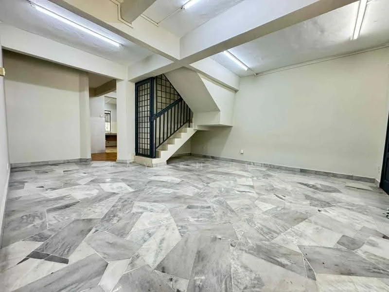 Room features: marble flooring, white painted walls, exposed ceiling, staircase with metal railing, large open space, natural light from windows, no visible furniture, neutral color palette; style: modern.