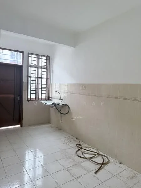 Laundry features: white tiled flooring, cream tiled walls, single-bowl stainless-steel sink, wall-mounted faucet, window with wooden grille, door leading outside, exposed plumbing, hose on floor.