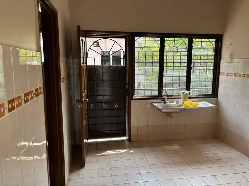 Laundry features: single-bowl stainless-steel sink, wooden door, tiled walls with decorative border, window with metal grille, ceramic tile flooring, natural light from window, countertop space, drainage outlet; view: garden.
