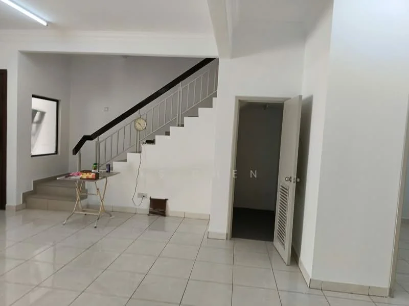 Room features: white painted walls, tile flooring, staircase with metal railing, door with white panel, window with black frame, clock on wall, open space layout, light fixture on ceiling; style: modern.