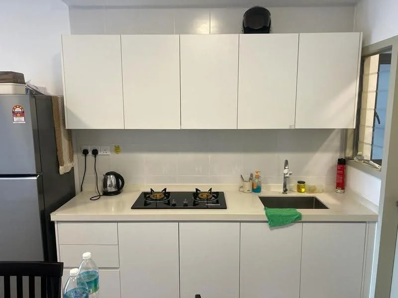 Kitchen features: white cabinetry with flat-panel doors, light-colored countertop, stainless-steel sink, chrome pull-down faucet, gas stove with two burners, kettle, black appliances, wall-mounted cabinets, tile backsplash, under-cabinet lighting; style: modern.