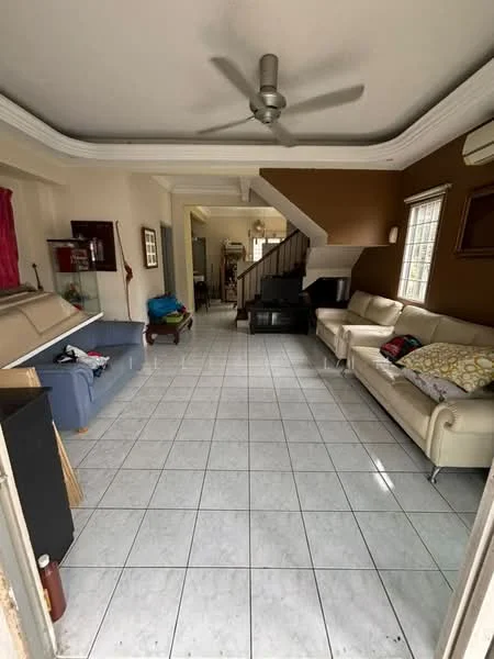 Living features: white tiled flooring, cream leather sofa, 3-seater sofa, 2-seater sofa, ceiling fan, wall-mounted air conditioning unit, staircase leading to upper floor, decorative crown moulding, large window with sheer curtains, wall with brown paint, open layout, decorative wall shelf; style: modern.