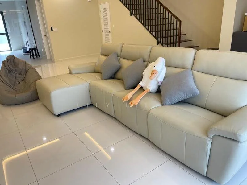 Living features: L-shape sectional leather sofa in light beige, 3 decorative cushions on sofa, bean bag chair in corner, glossy white tile flooring, recessed LED lighting, neutral painted walls, staircase in background, large windows for natural light; style: modern.