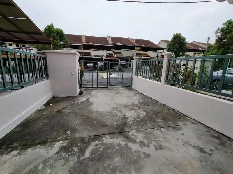 Exterior type: linked terrace house; features: concrete driveway, metal gate, fenced perimeter, paved surface, surrounding greenery, car parking area, single-storey structure, covered carport; style: modern.