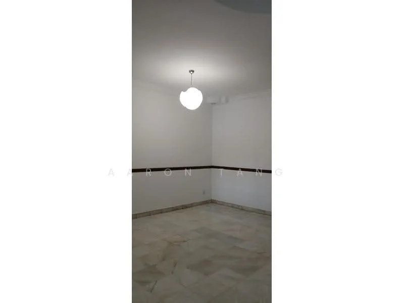 Room features: white painted walls, marble flooring, ceiling light fixture, crown moulding.