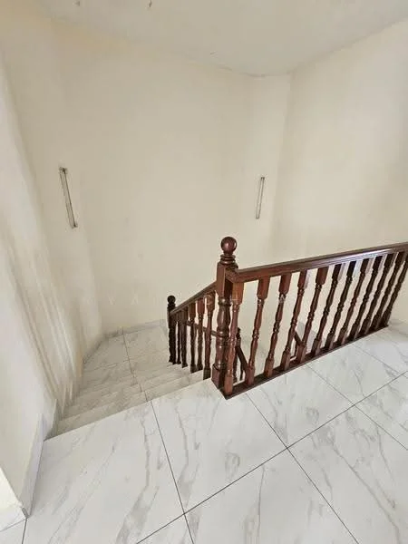 Room features: white painted walls, marble tile flooring, wooden handrail, staircase with balustrade, wall-mounted light fixtures.