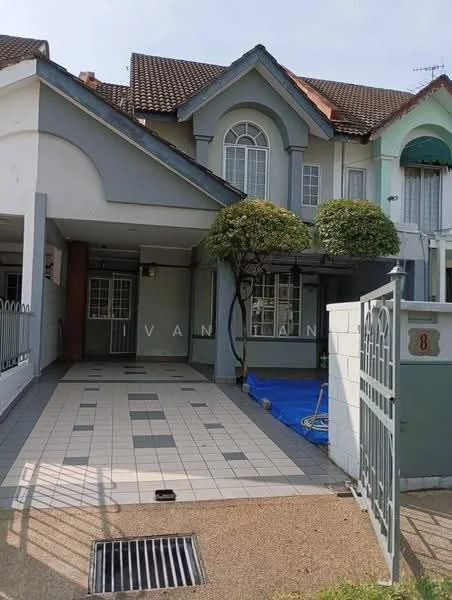 Exterior type: linked terrace house; features: grey painted facade, gabled roof, manicured front garden, paved driveway, front porch, window with arch detail, security gate, decorative tree in front yard; style: modern.