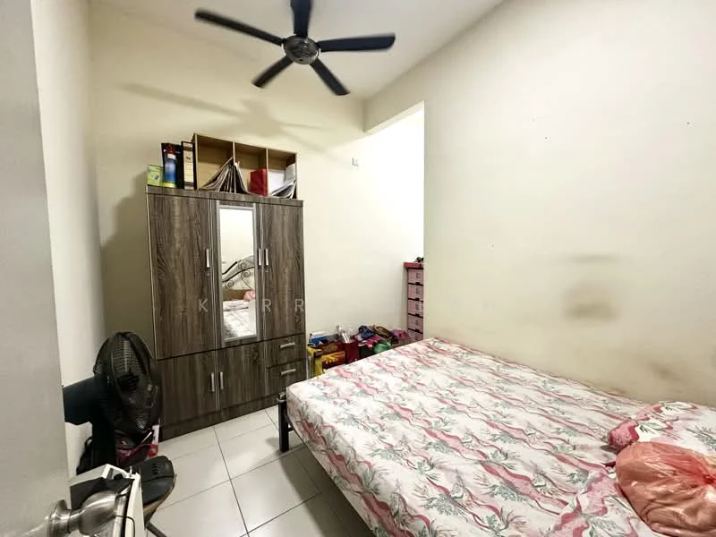 Bedroom features: queen-size bed with floral bedding, wooden wardrobe with mirrored doors, pink decorative pillow, white tiled flooring, ceiling fan, wall-mounted shelves, small pink storage unit, standing fan, neutral painted walls.