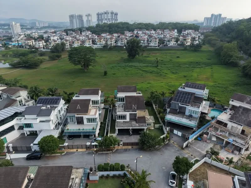 Exterior type: detached bungalow; features: two-storey houses, rooftop solar panels, manicured lawns, driveways, surrounding greenery, adjacent to open field, view of residential area in background, paved road, gated community entrance; style: modern.