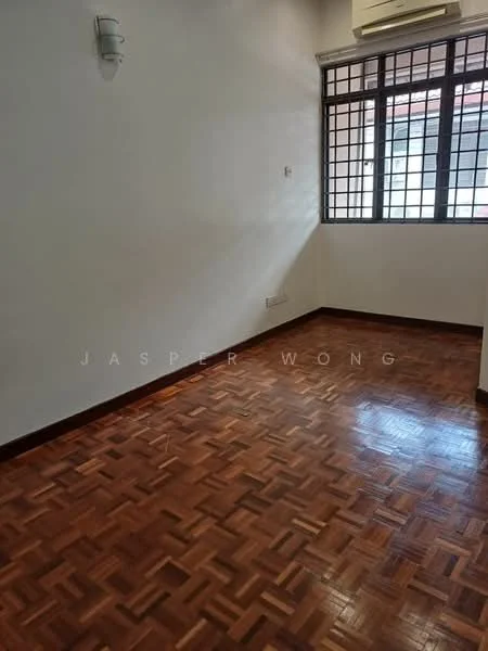 Room features: wooden flooring, white painted walls, window with grid pattern, wall-mounted light fixture, air conditioning unit.