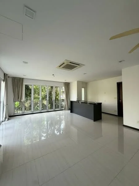 Living features: white painted walls, polished ceramic tile flooring, 5-blade ceiling fan, wall-mounted split AC, floor-to-ceiling windows, sheer curtains, black kitchen island, recessed downlights, open layout, natural light from windows, view of greenery; style: modern; view: garden.