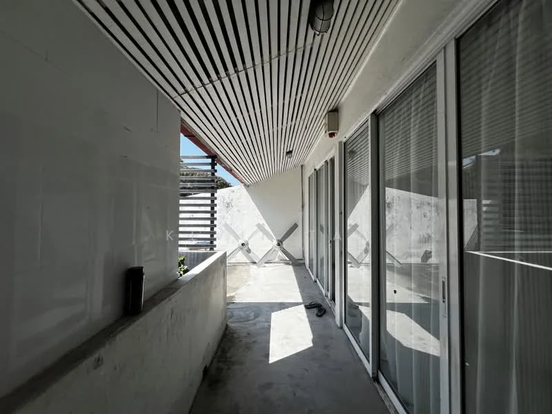 Room features: sliding glass doors, concrete flooring, horizontal wooden ceiling with slats, exposed concrete wall, natural light from windows, minimalist design; style: modern.