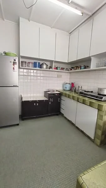 Kitchen features: stainless-steel fridge, white upper cabinets, dark lower cabinets, white tiled backsplash, gas stove with exhaust hood, sink with faucet, countertop with green tiles, wall-mounted shelves, ceramic tile flooring, overhead fluorescent lighting; style: modern.