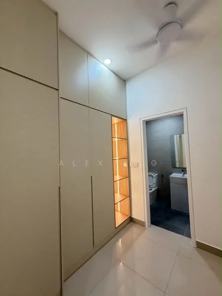 Room features: built-in cabinets with lighted shelves, cream cabinetry, white walls, recessed lighting, ceiling fan, glossy tile flooring, doorway leading to bathroom, neutral color palette; style: modern.