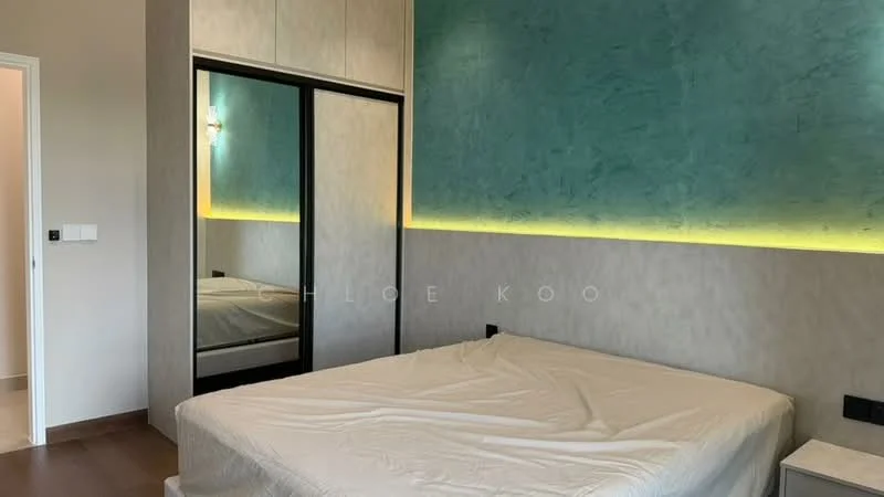 Bedroom features: queen-size bed, upholstered headboard, built-in wardrobe with sliding doors, green accent wall, recessed LED strip lighting, wooden flooring, wall-mounted light fixture, neutral painted walls; style: modern.
