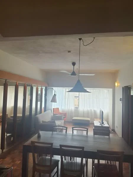 Living features: wooden flooring, white painted walls, ceiling fan, pendant light, sofa, armchair, TV console, wall-mounted TV, large windows with sheer curtains, dining table with chairs, decorative wall mirrors; style: modern.