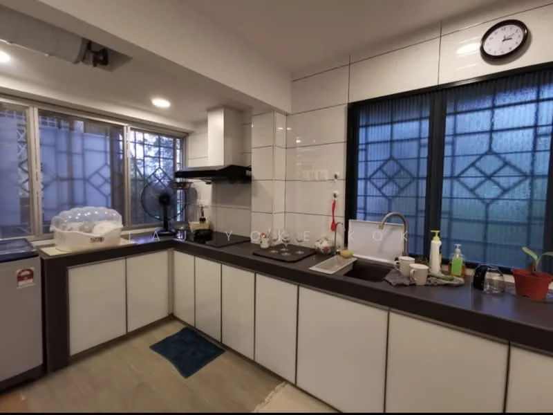 Kitchen features: white cabinetry with flat-panel doors, black countertop, single-bowl stainless-steel sink, chrome pull-down faucet, built-in stove with hood, refrigerator, window with grid pattern, tile backsplash, grey vinyl plank flooring, wall-mounted clock, kitchen utensils on countertop, dish soap and cleaning supplies, potted plant on windowsill; style: modern; view: garden.