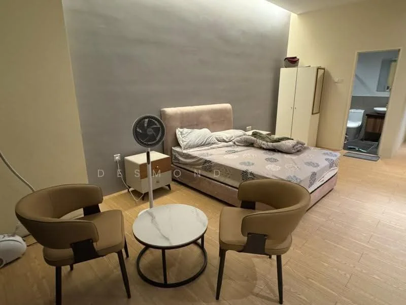 Bedroom features: queen-size bed with upholstered headboard, bedding with decorative pillows, 2 beige upholstered chairs, round marble-top coffee table, wooden flooring, wall-mounted fan, light beige painted walls, built-in wardrobe, en-suite bathroom visible in background; style: modern.