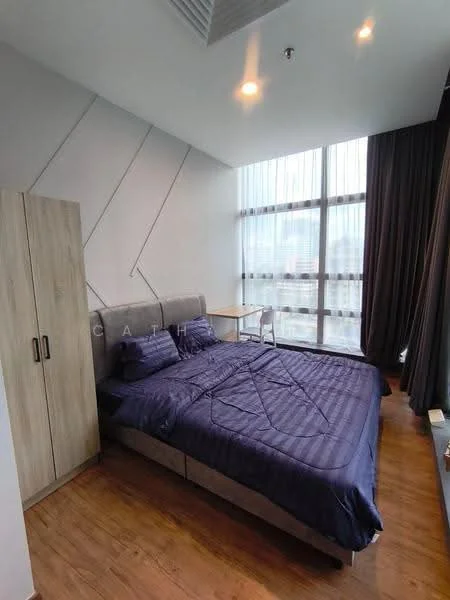 Bedroom features: king-size bed with navy blue bedding, upholstered headboard, wooden wardrobe with sliding doors, study desk with chair, floor-to-ceiling windows, sheer curtains, wooden flooring, recessed ceiling lights; style: modern; view: city.