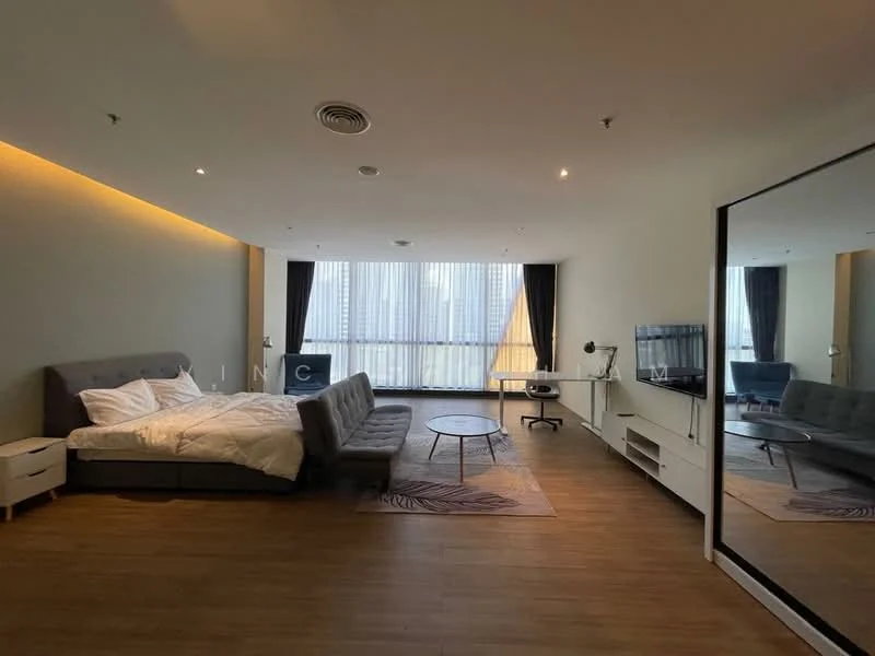 Bedroom features: king-size bed with white bedding, grey fabric sectional sofa, round coffee table, wall-mounted TV, white TV console, large floor-to-ceiling windows, blackout curtains, wooden flooring, recessed lighting, mirror wardrobe, decorative area rug; style: modern; view: city.