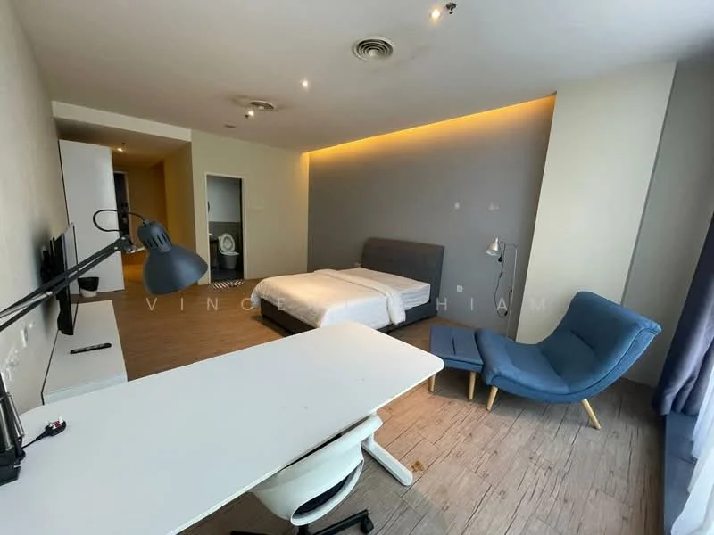 Bedroom features: queen-size bed with grey upholstered headboard, light wood flooring, wall-mounted TV, study desk with white finish, white office chair, blue accent chair, recessed lighting, floor-to-ceiling window with grey curtains, air conditioning unit, decorative wall with soft lighting; style: modern.