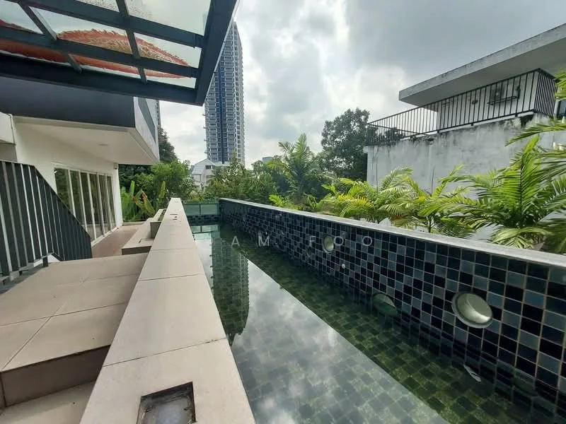 Exterior type: detached bungalow; features: infinity pool, pool deck with loungers, landscaping with tropical plants, glass roof structure, stone-paved walkway, surrounded by greenery; style: modern.
