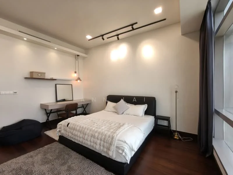 Bedroom features: king-size bed with white bedding, upholstered headboard, wooden bedside table, desk with chair, track lighting, pendant light, floor lamp, dark curtains, light grey area rug, wooden flooring, white painted walls, large window with city view; style: modern; view: city.